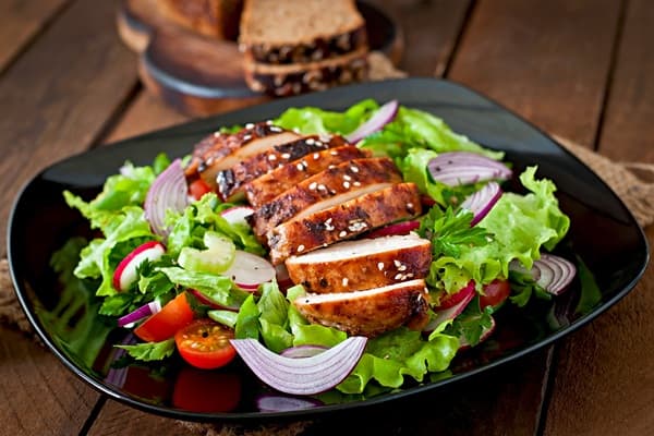 Grilled chicken salad with fresh greens